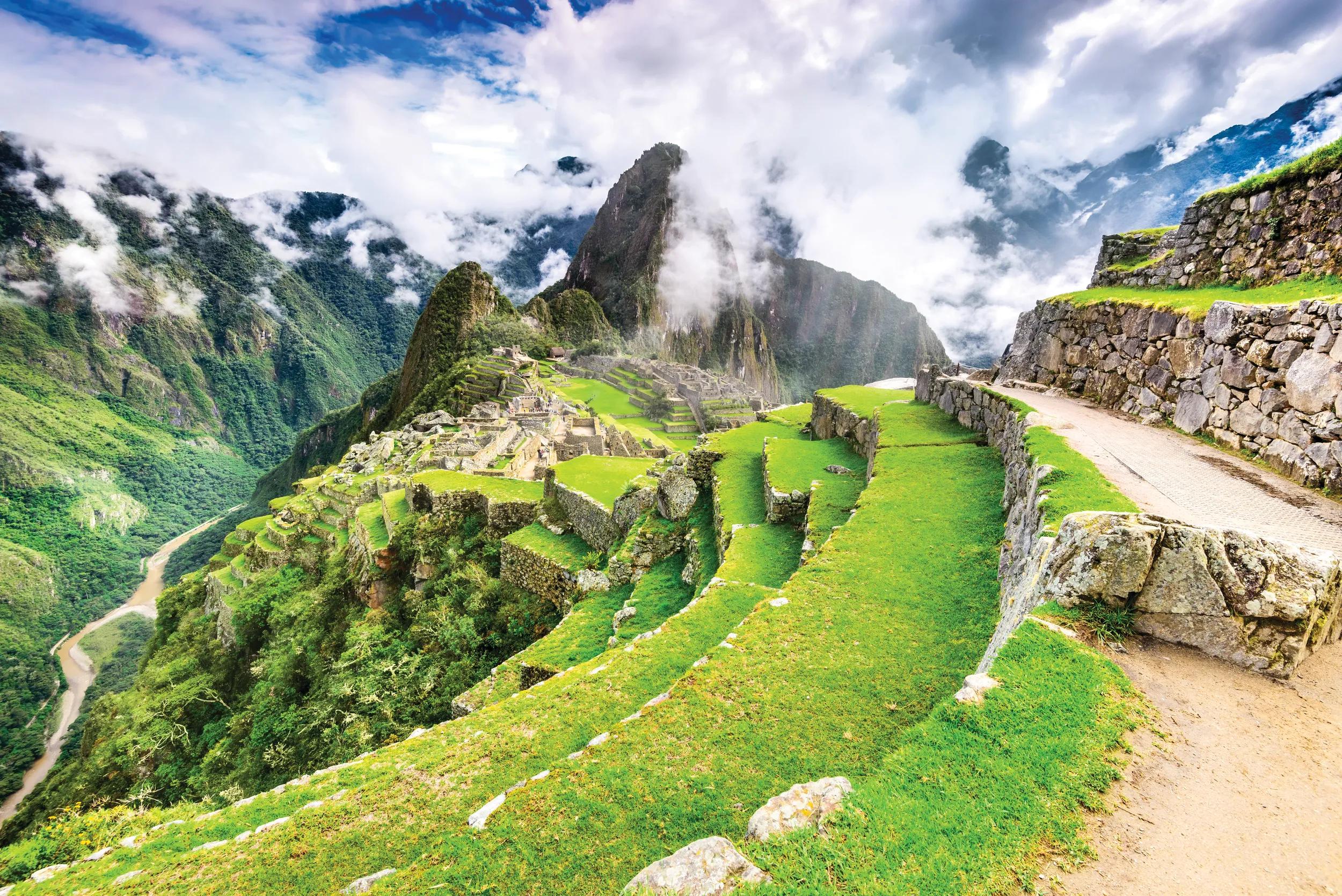Machu Picchu, Peru - Ruins of Inca Empire city and Huaynapicchu Mountain, Sacred Valley, Cusco. Amazing place of South America.