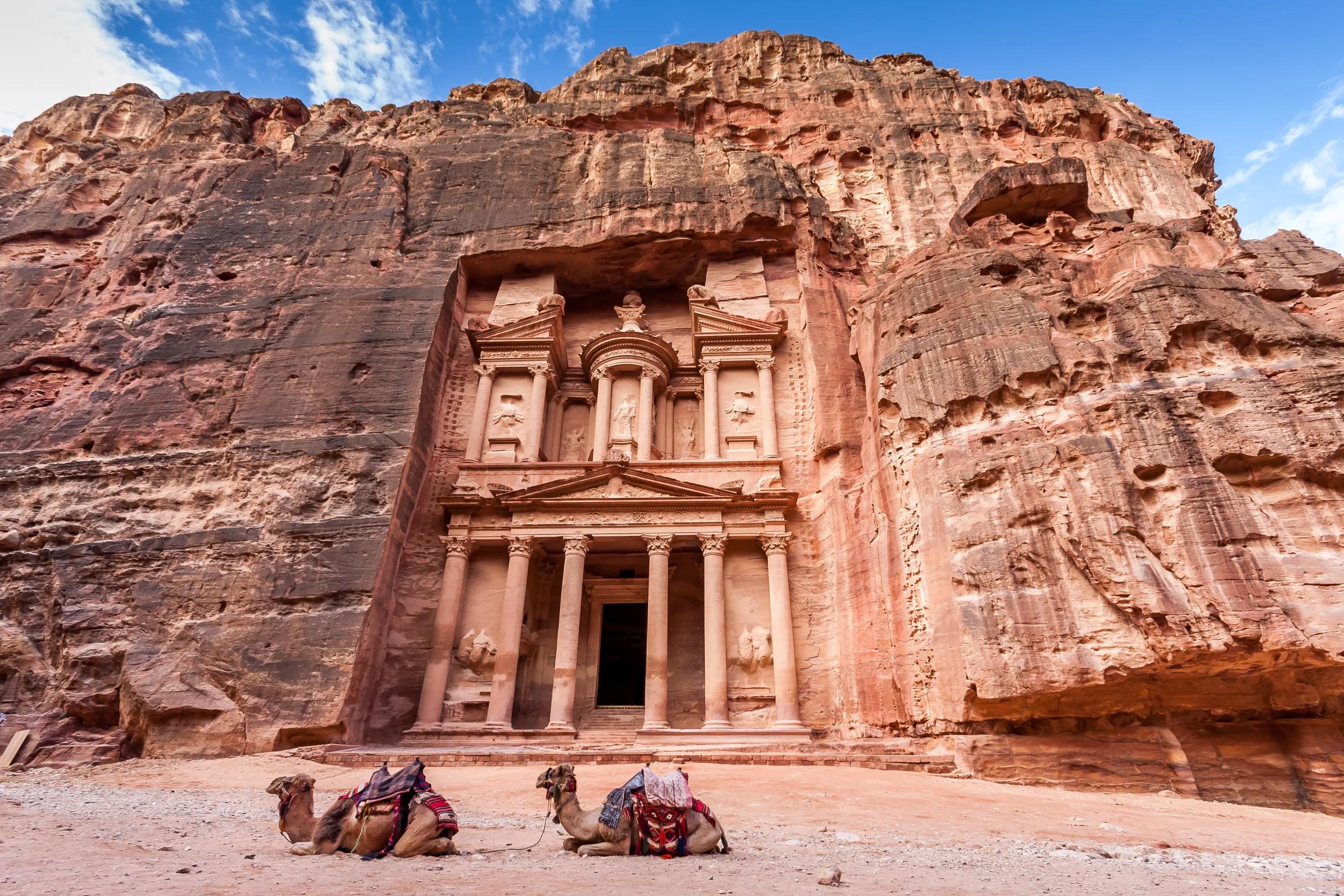 Camels resting in front of Al Khazneh (The Treasury) in Petra at sunrise, Ma'an Governorate, Jordan