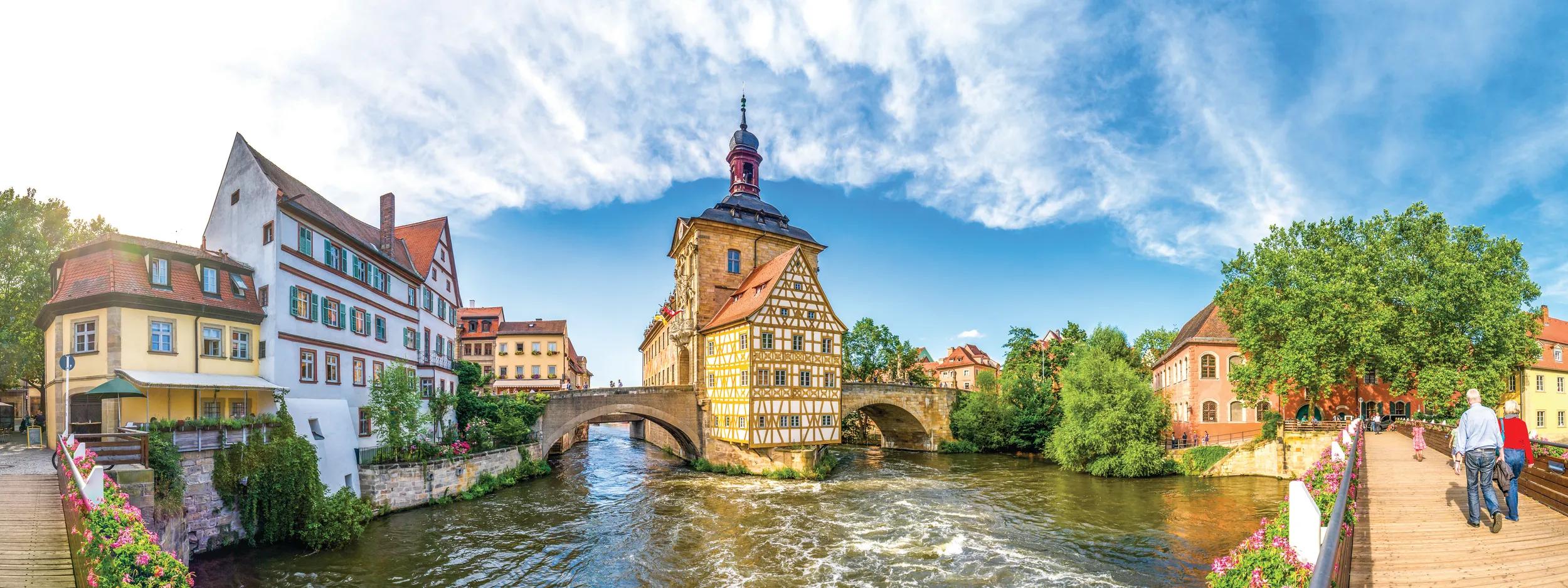 Bamberg is a town in Upper Franconia, Germany, on the river Regnitz. A large part of the town is a UNESCO World Heritage Site, Old town hall (Altes Rathaus) is centre in image.