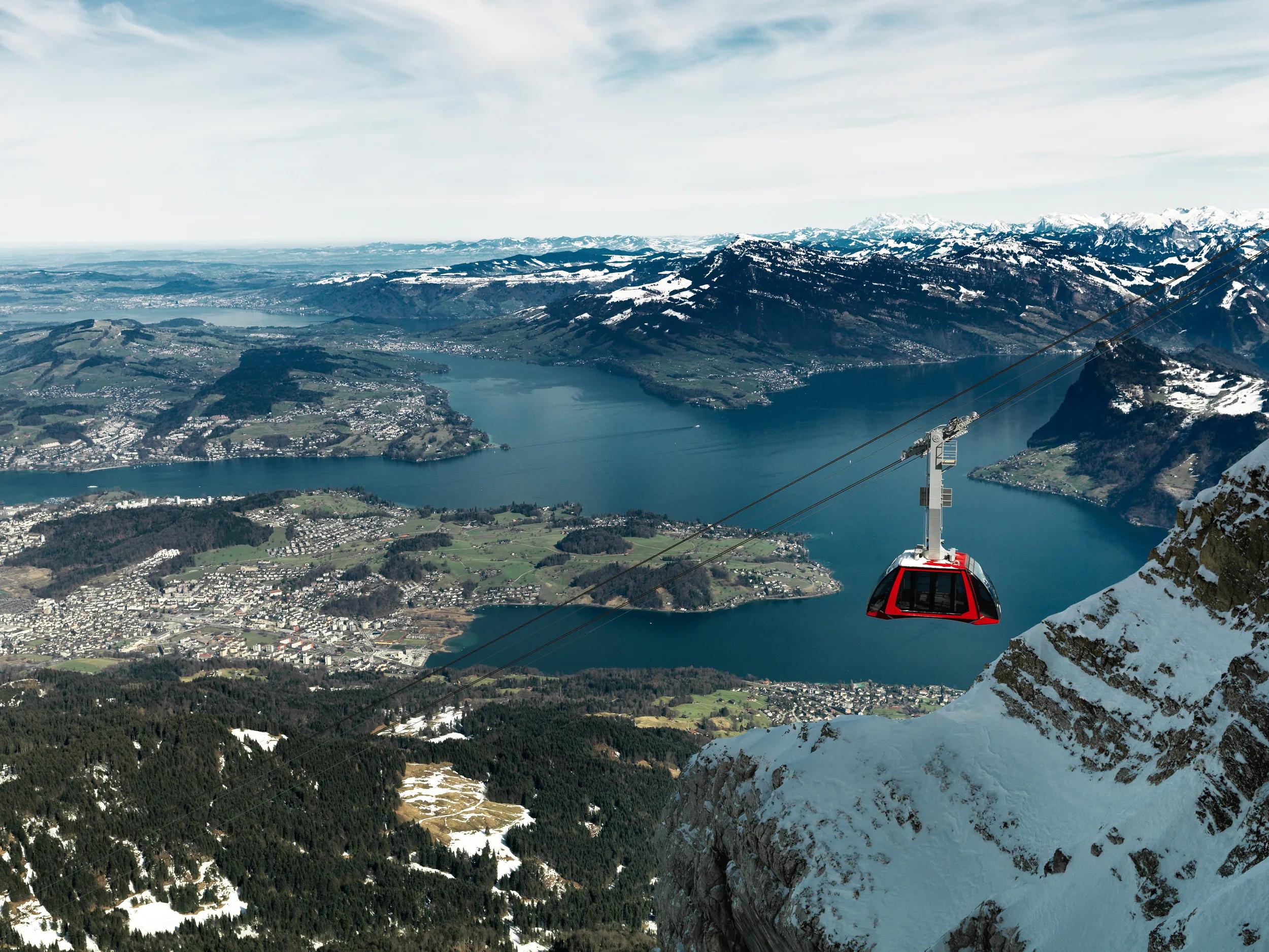 The Dragon Ride aerial cableway from Fräkmüntegg to Pilatus Kulm takes just 3.5 minutes, with breathtaking views over Lake Lucerne, Switzerland.